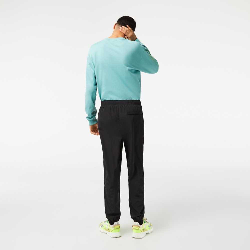 Black Lacoste Track Pants with GPS Coordinates | RGBZNE-948