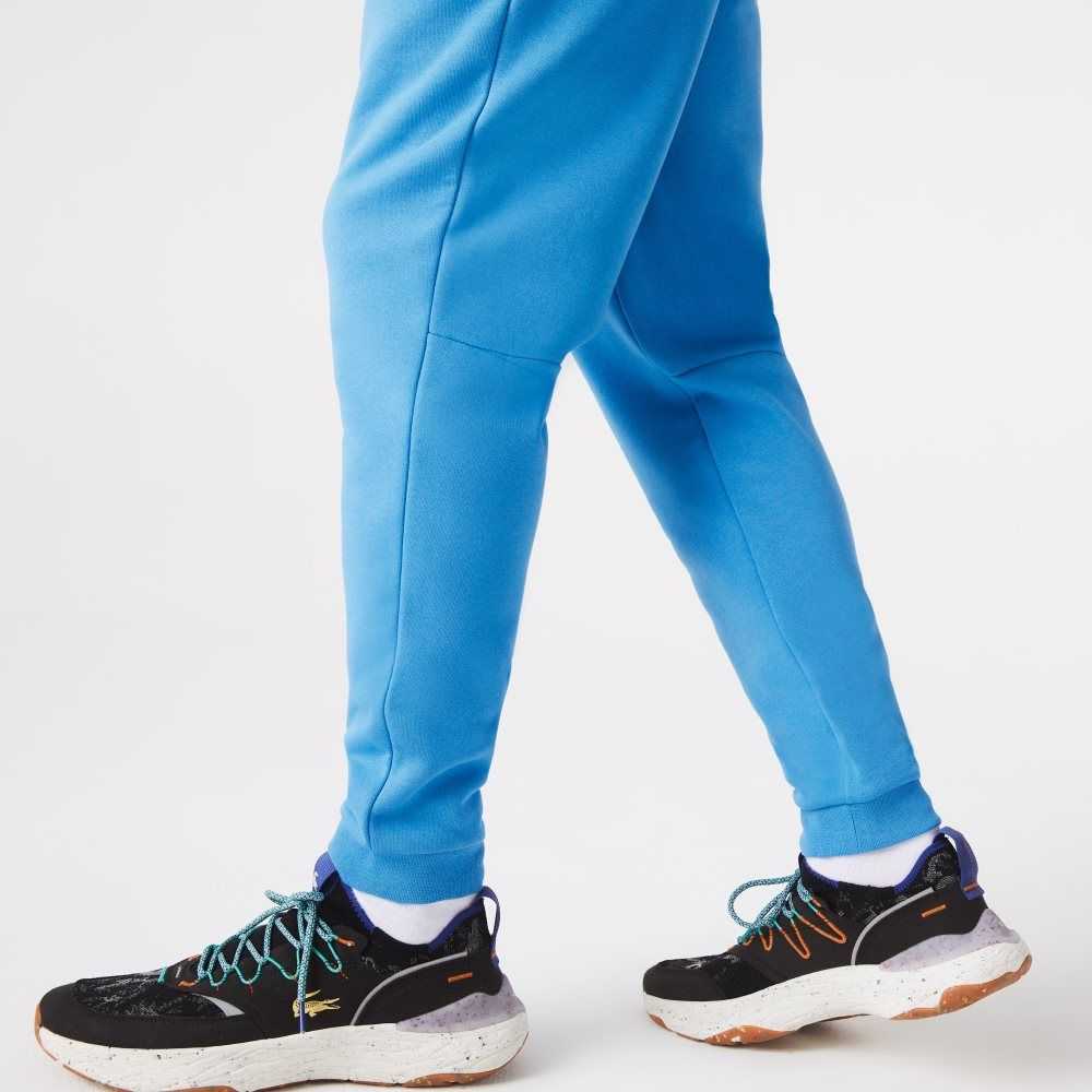 Blue Lacoste Tapered Fit Fleece Trackpants | CFNXUK-421