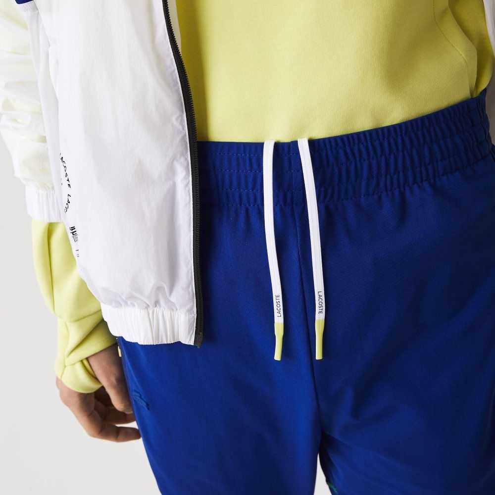 Blue / White Lacoste SPORT Zip Pockets Tapered Tracksuit Pants | TBKLGA-015