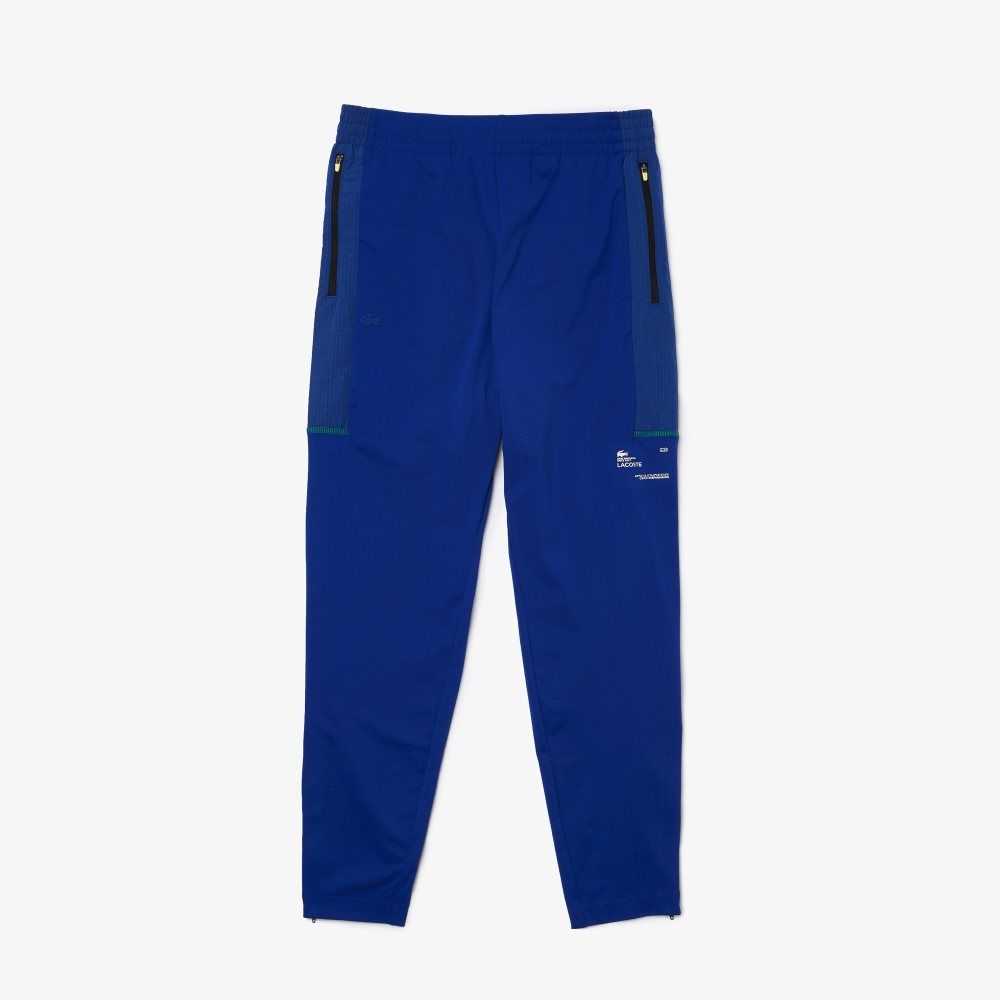 Blue / White Lacoste SPORT Zip Pockets Tapered Tracksuit Pants | TBKLGA-015