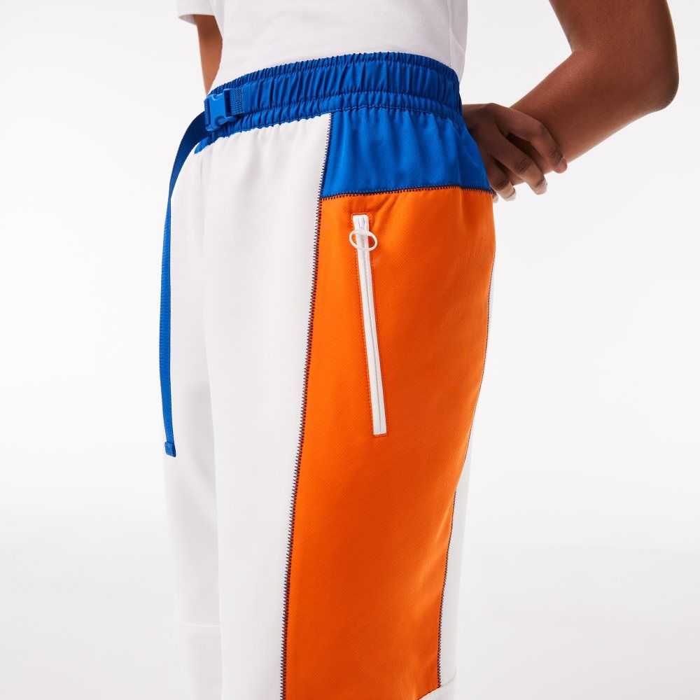 White / Blue / Orange / Blue Lacoste Badge Colorblock Trackpants | VZCNDY-158